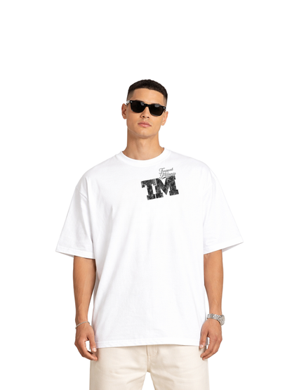 Trapped Milano white oversized graphic t shirt at unseen grail. local brands south africa. streetwear. men and women. studio image male model front