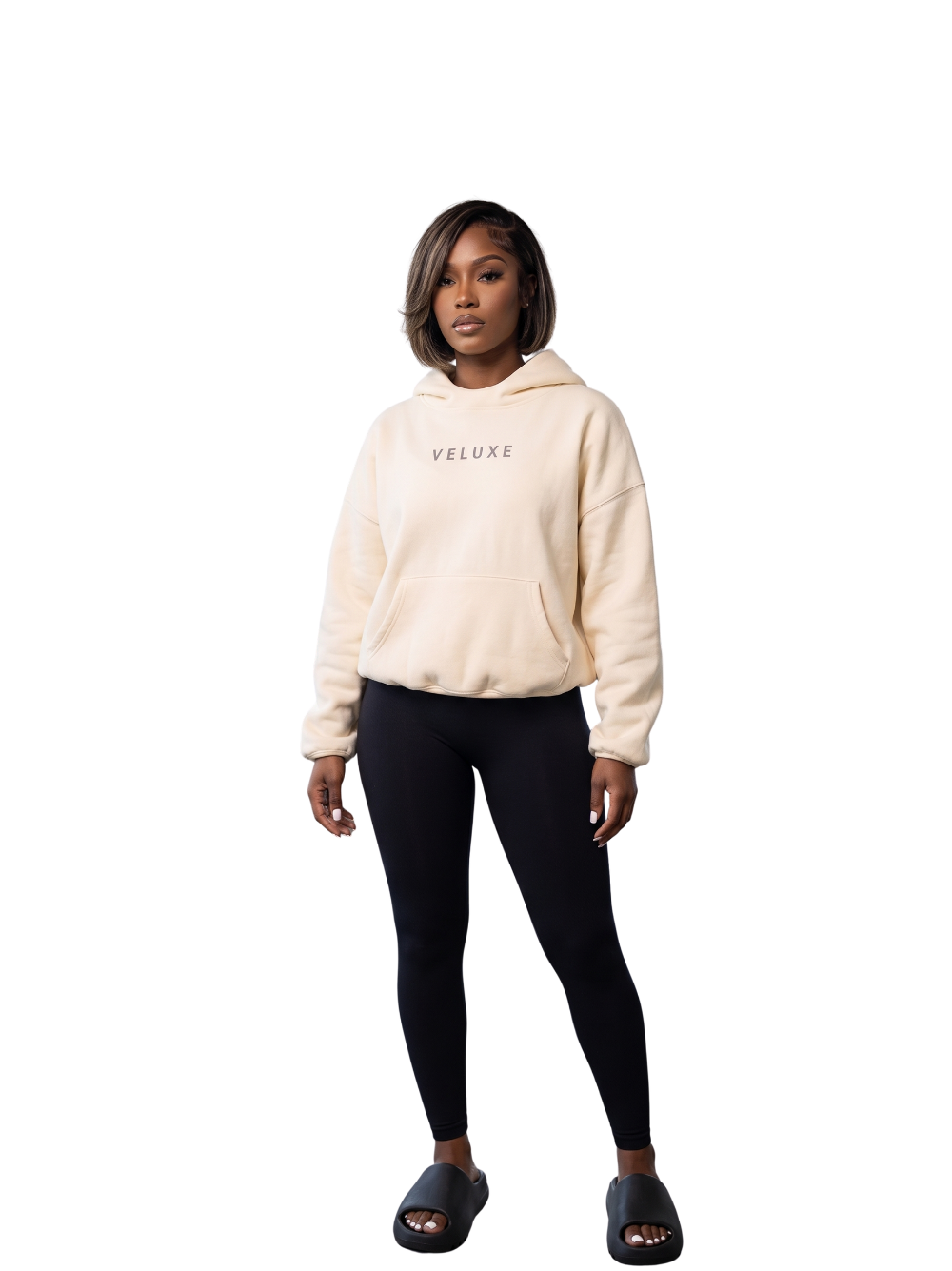 Veluxe beige oversized graphic hoodie at unseen grail. local brands south africa. streetwear. men and women. studio image female model full outfit