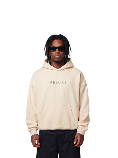 Veluxe beige oversized graphic hoodie at unseen grail. local brands south africa. streetwear. men and women. studio image male model