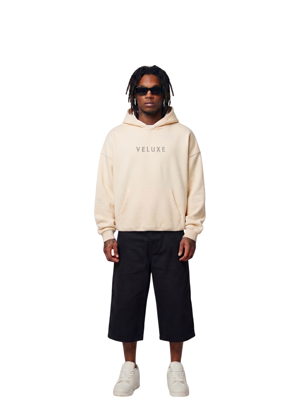 Veluxe beige oversized graphic hoodie at unseen grail. local brands south africa. streetwear. men and women. studio image male model full outfit