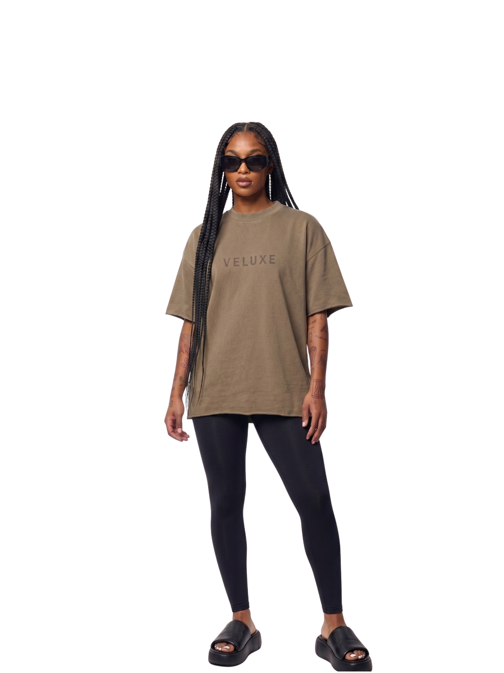 Veluxe brown oversized graphic t shirt at unseen grail. local brands south africa. streetwear. men and women. studio image female model full outfit