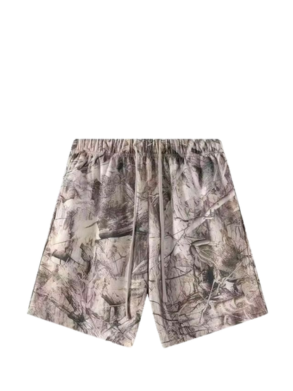Veluxe camo oversized graphic shorts at unseen grail. local brands south africa. streetwear. men and women. studio image