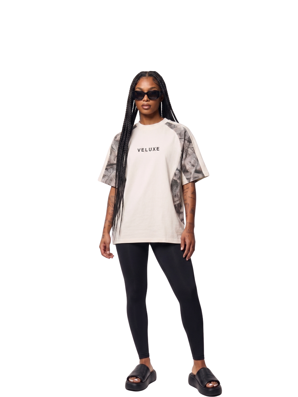 Veluxe camo oversized graphic t shirt at unseen grail. local brands south africa. streetwear. men and women. studio image female model full outfit