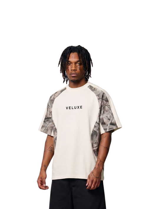 Veluxe camo oversized graphic t shirt at unseen grail. local brands south africa. streetwear. men and women. studio image male model