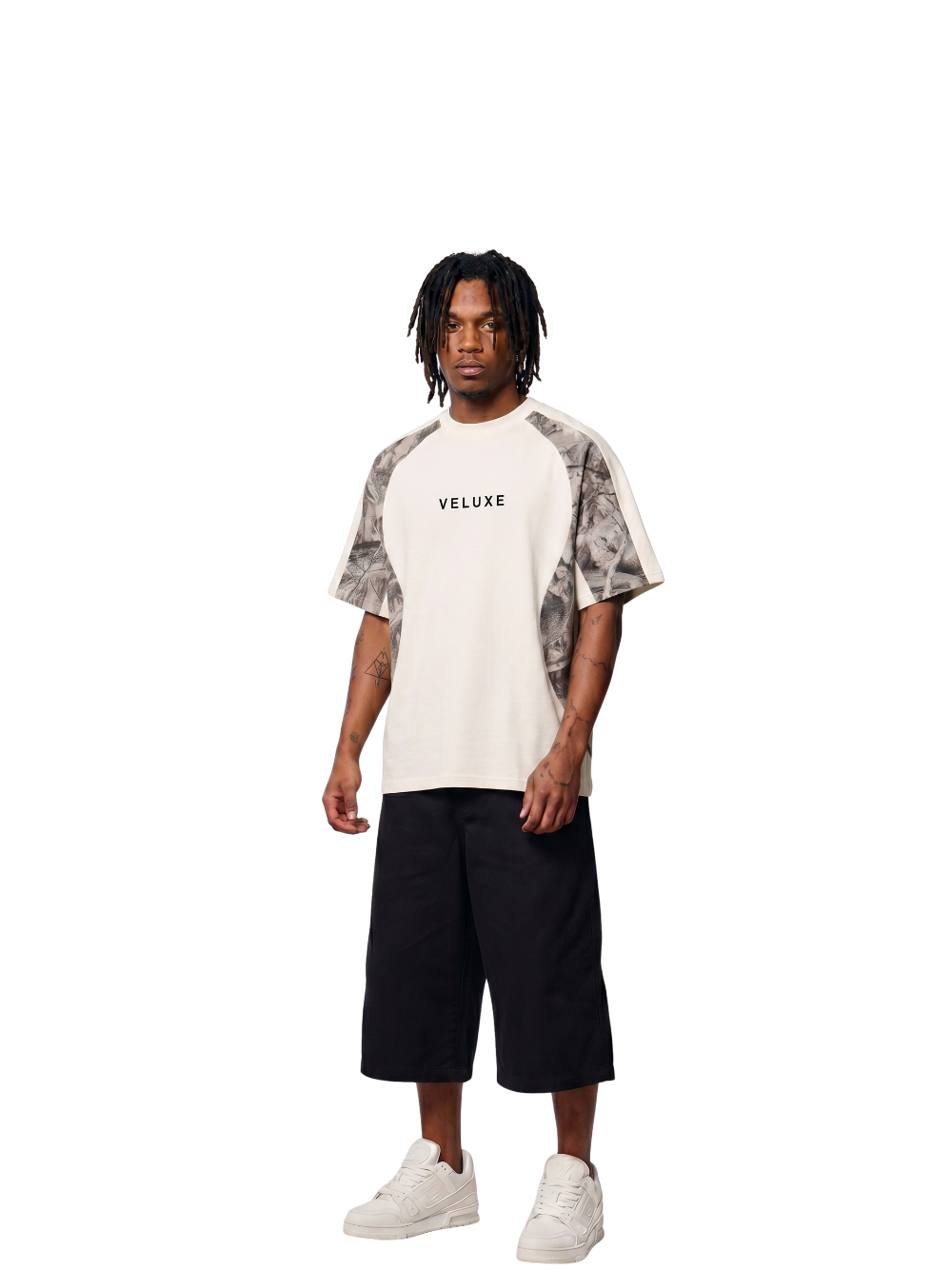 Veluxe camo oversized graphic t shirt at unseen grail. local brands south africa. streetwear. men and women. studio image male model full outfit