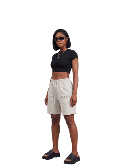 Veluxe grey oversized graphic shorts at unseen grail. local brands south africa. streetwear. men and women. studio image female model full outfit