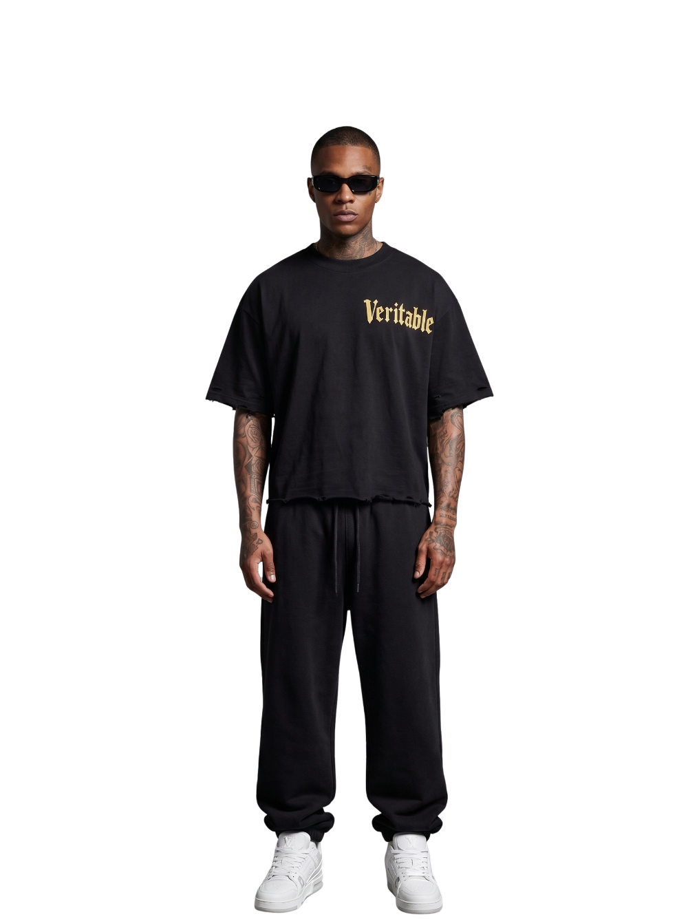 Veritable black oversized tshirt at unseen grail. men and women. south africa top local brands all at unseen grail. studio image male model front full outfit