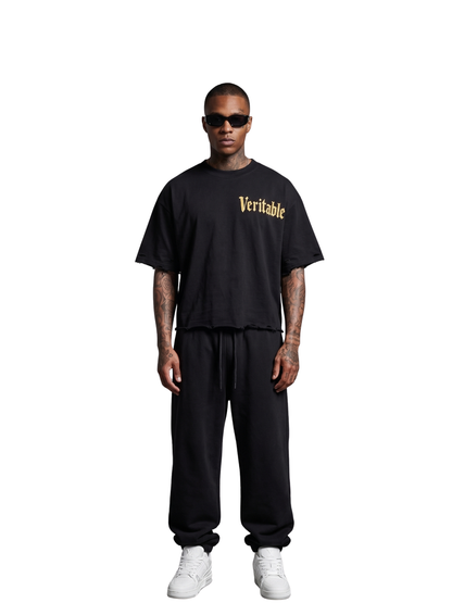 Veritable black oversized tshirt at unseen grail. men and women. south africa top local brands all at unseen grail. studio image male model front full outfit