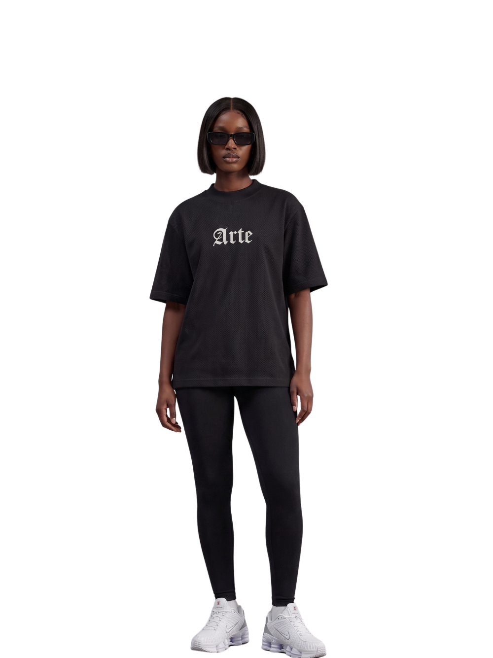 arte black oversized graphic t shirt at unseen grail. local brands south africa. streetwear. men and women. galxboy. bantu. el patron. front female model. streetwear