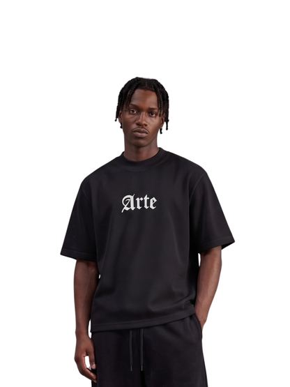 arte black oversized graphic t shirt at unseen grail. local brands south africa. streetwear. men and women. galxboy. bantu. el patron. front male model