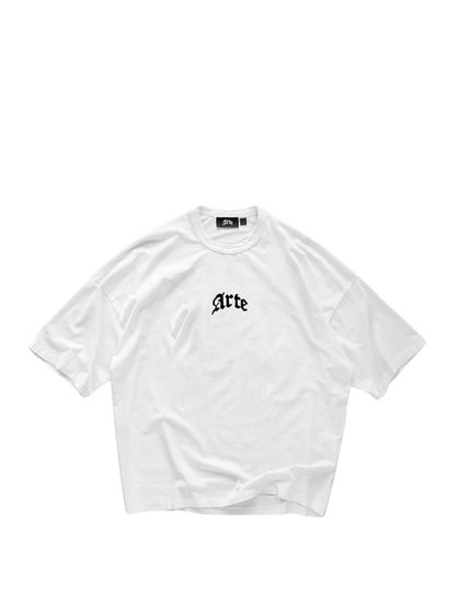 arte white oversized graphic t shirt at unseen grail. local brands south africa. streetwear. men and women. galxboy. bantu. studio image behind
