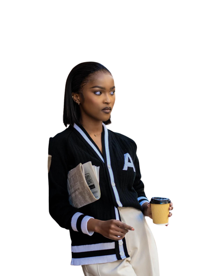 ascend black knitted cardigan jersey at unseen grail. local brands south africa. streetwear. men and women. studio image front galxboy and boys of soweto female model with handbag bantu