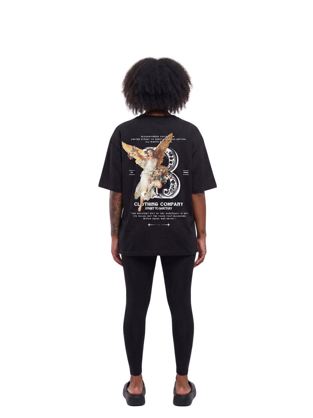 black river black oversized graphic t-shirt at unseen grail. local brands south africa. streetwear. men and women. studio image behind female model. galxboy, bantu, boys of soweto