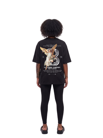 black river black oversized graphic t-shirt at unseen grail. local brands south africa. streetwear. men and women. studio image behind female model. galxboy, bantu, boys of soweto