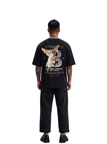 black river black oversized graphic t-shirt at unseen grail. local brands south africa. streetwear. men and women. studio image behind male model. galxboy, bantu, boys of soweto