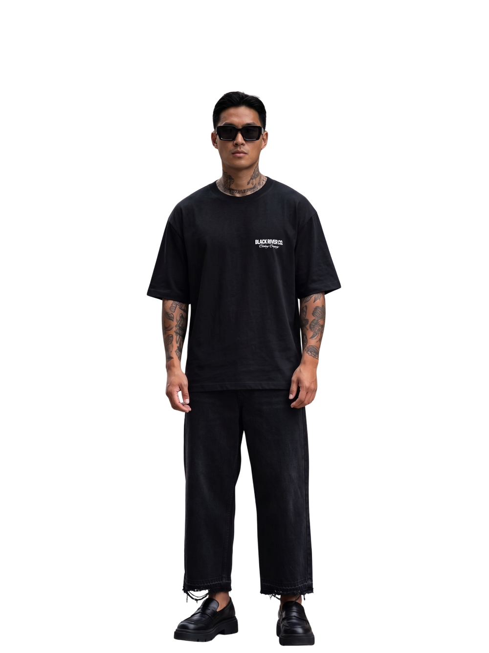 black river black oversized graphic t-shirt at unseen grail. local brands south africa. streetwear. men and women. studio image male model front. galxboy, bantu