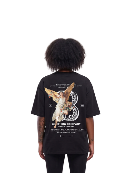 black river black oversized graphic t-shirt at unseen grail. local brands south africa. streetwear. men and women. studio image women behind. galxboy, bantu, boys of soweto