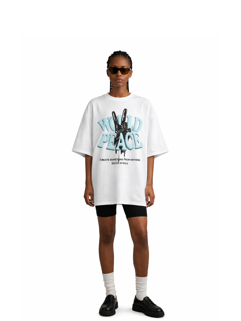 blank collection white oversized graphic t shirt at unseen grail. local brands south africa. streetwear. men and women. studio image female model front view full outfit