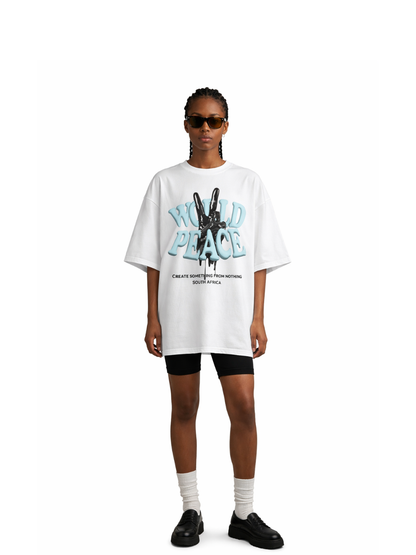 blank collection white oversized graphic t shirt at unseen grail. local brands south africa. streetwear. men and women. studio image female model front view full outfit