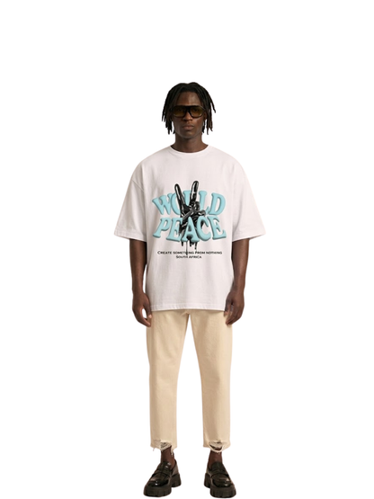 blank collection white oversized graphic t shirt at unseen grail. local brands south africa. streetwear. men and women. studio image male model full outfit front