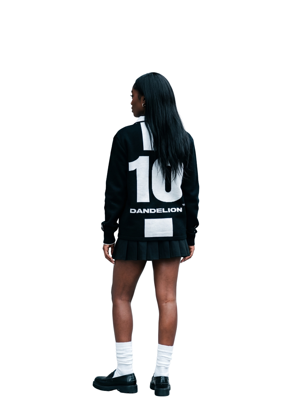 dandelion black and white knitwear sweater at unseen grail. local brands south africa. streetwear. men and women. studio image female model behind view full outfit