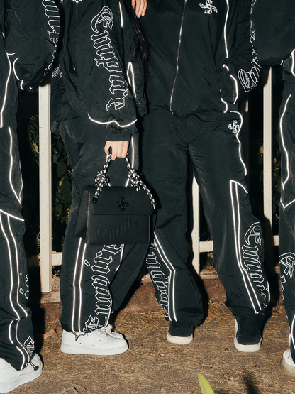 empire black oversized graphic tracksuit at unseen grail. local brands south africa. streetwear. men and women. group image galxboy, bantu pants
