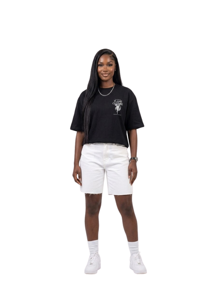 flame culture black oversized graphic t shirt at unseen grail. local brands south africa. streetwear. men and women. studio image female model front full image