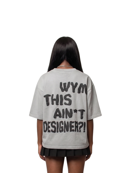 fourfourty grey oversized graphic t shirt at unseen grail. local brands south africa. streetwear. men and women. studio image female model behind