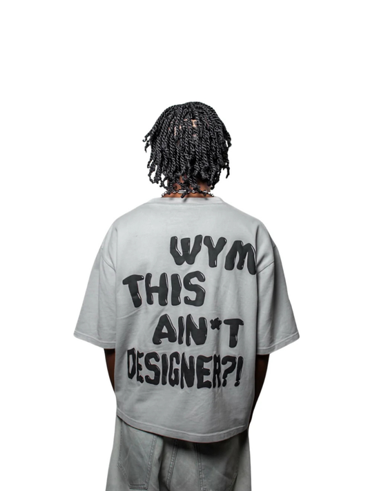 fourfourty grey oversized graphic t shirt at unseen grail. local brands south africa. streetwear. men and women. studio image male model behind