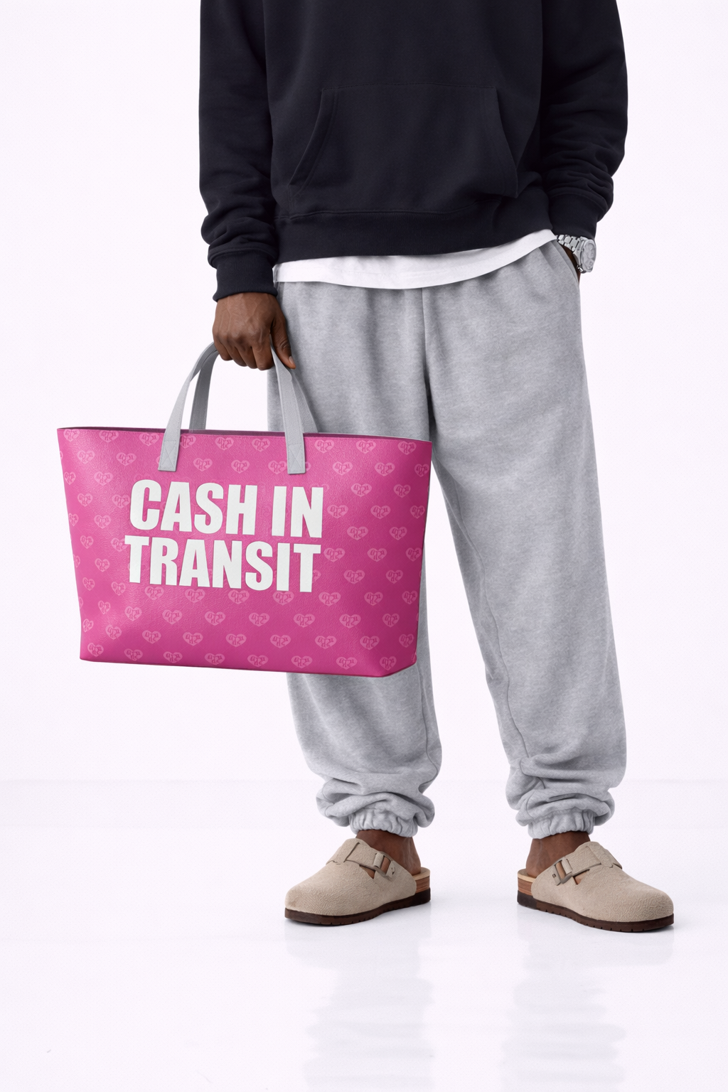 grade africa pink handbag totebag at unseen grail. local brands south africa. streetwear. men and women. studio image male model front
