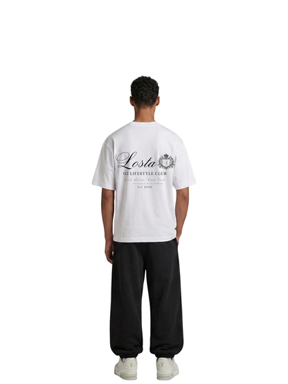 losta white oversized graphic tshirt at unseen grail. local brands south africa. streetwear. men and women. studio image male model behind full outfit