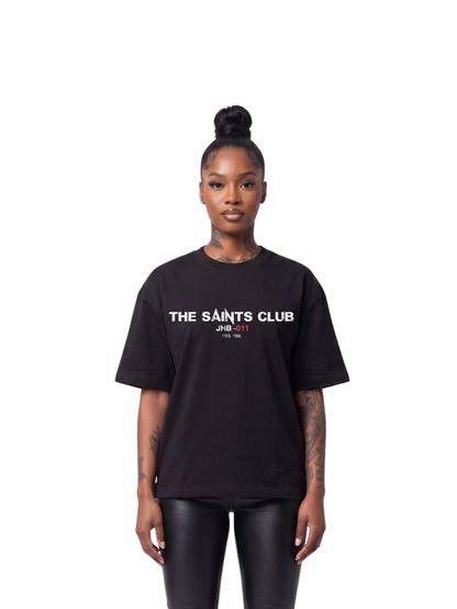 saint club black oversized tshirt at unseen grail. men and women. south africa top local brands all at unseen grail. studio image female model front