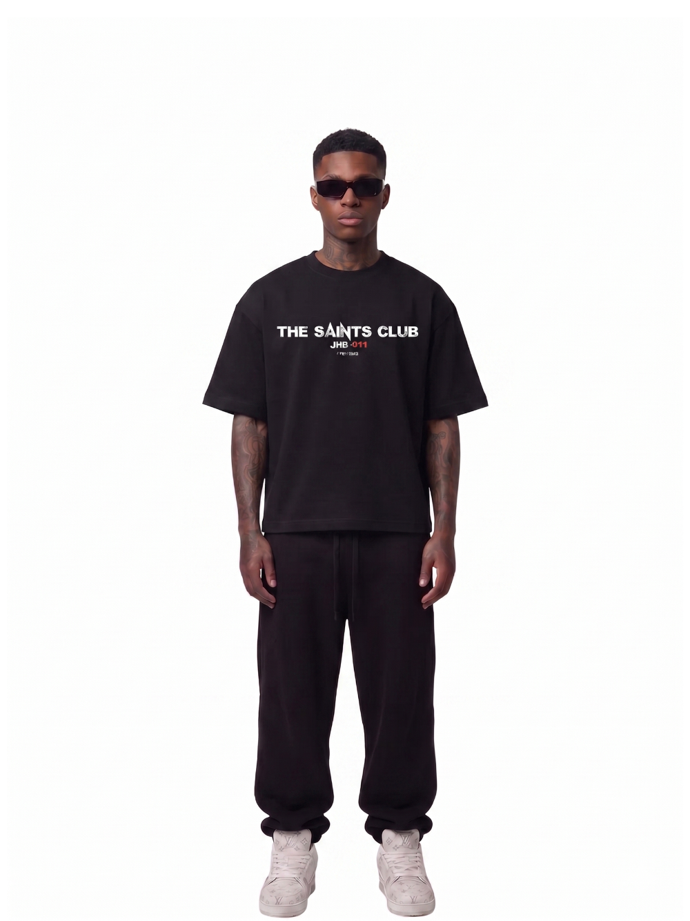 saint club black oversized tshirt at unseen grail. men and women. south africa top local brands all at unseen grail. studio image full outfit men