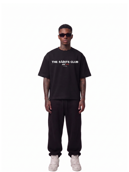 saint club black oversized tshirt at unseen grail. men and women. south africa top local brands all at unseen grail. studio image full outfit men