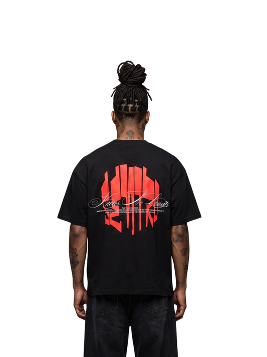 seniro black oversized graphic tshirt at unseen grail. local brands south africa. streetwear. men and women. male model behind studio image