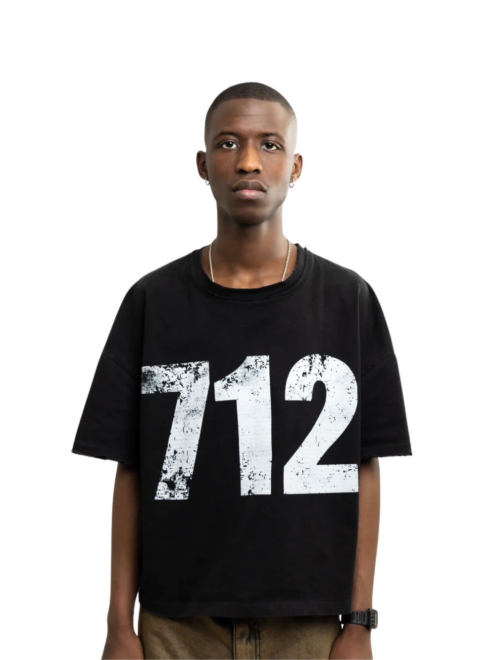 seventwelve studios black oversized tshirt at unseen grail. local brands south africa. streetwear. men and women. male model front image