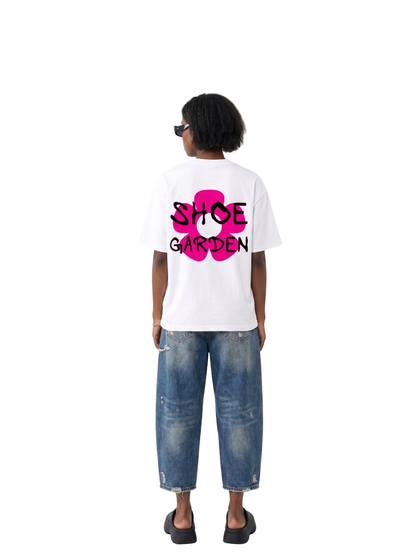 shoe garden white and pink oversized tshirt at unseen grail. men and women. south africa top local brands all at unseen grail. studio image female model behind