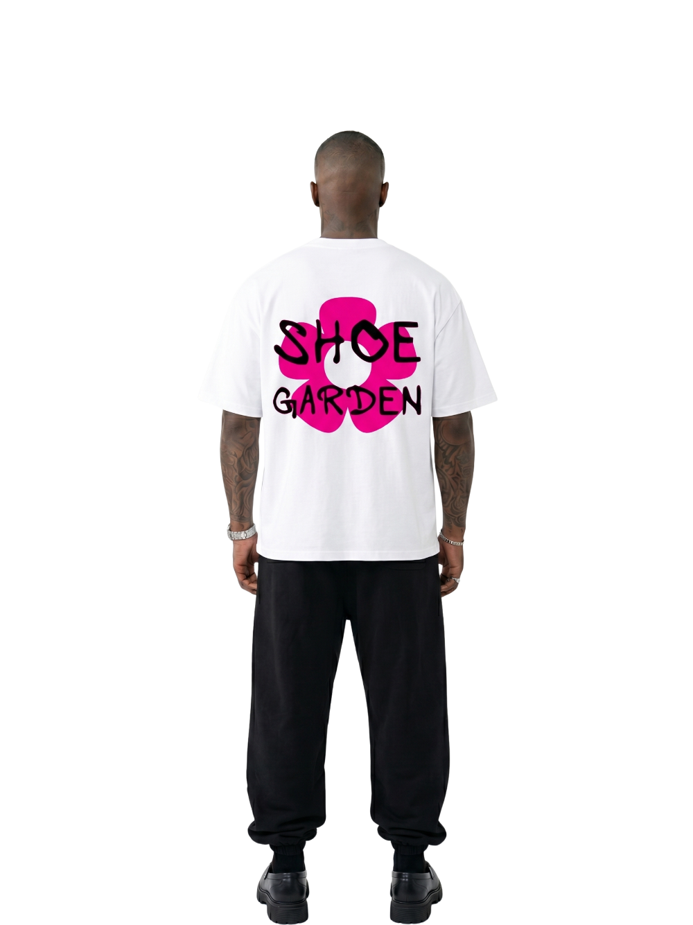 shoe garden white and pink oversized tshirt at unseen grail. men and women. south africa top local brands all at unseen grail. studio image male model behind