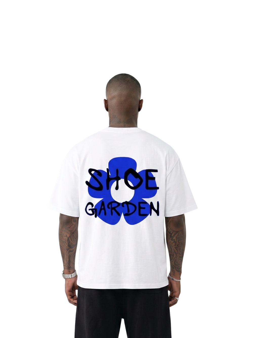 shoe garden white oversized tshirt at unseen grail. men and women. south africa top local brands all at unseen grail. studio image male model behind