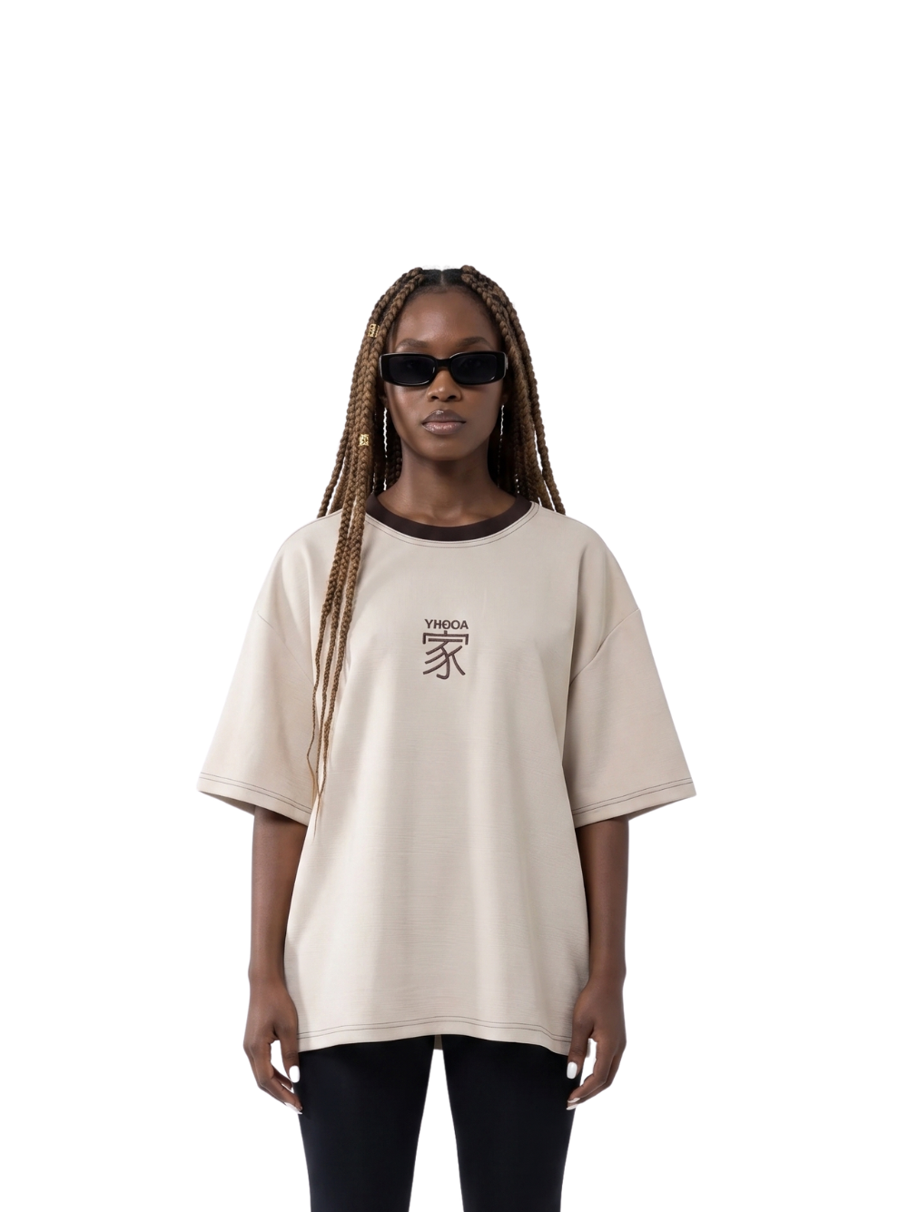 yhooa beige oversized graphic t shirt at unseen grail. local brands south africa. streetwear. men and women. studio image female model front