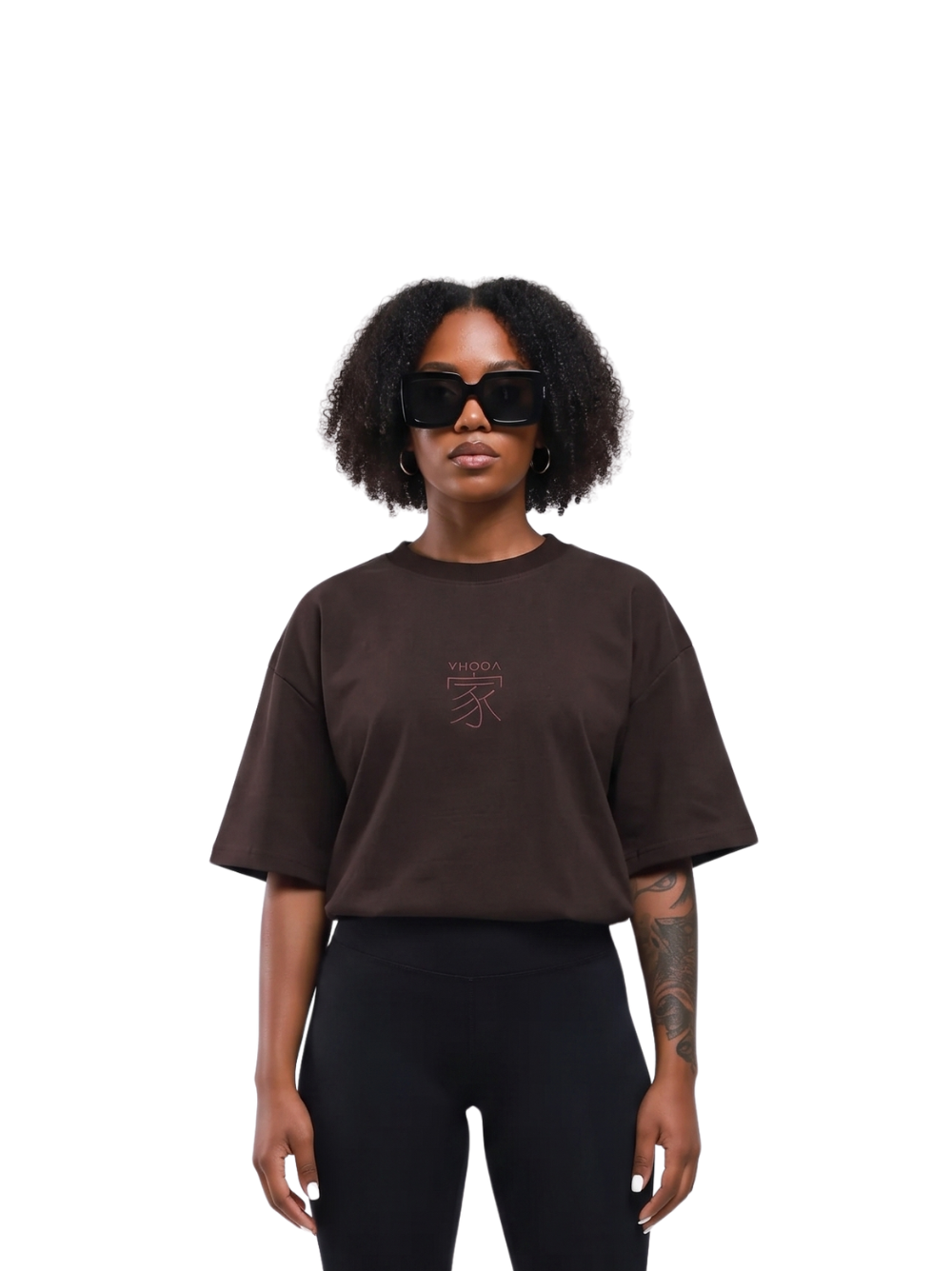 yhooa brown oversized graphic t shirt at unseen grail. local brands south africa. streetwear. men and women. studio image female model front