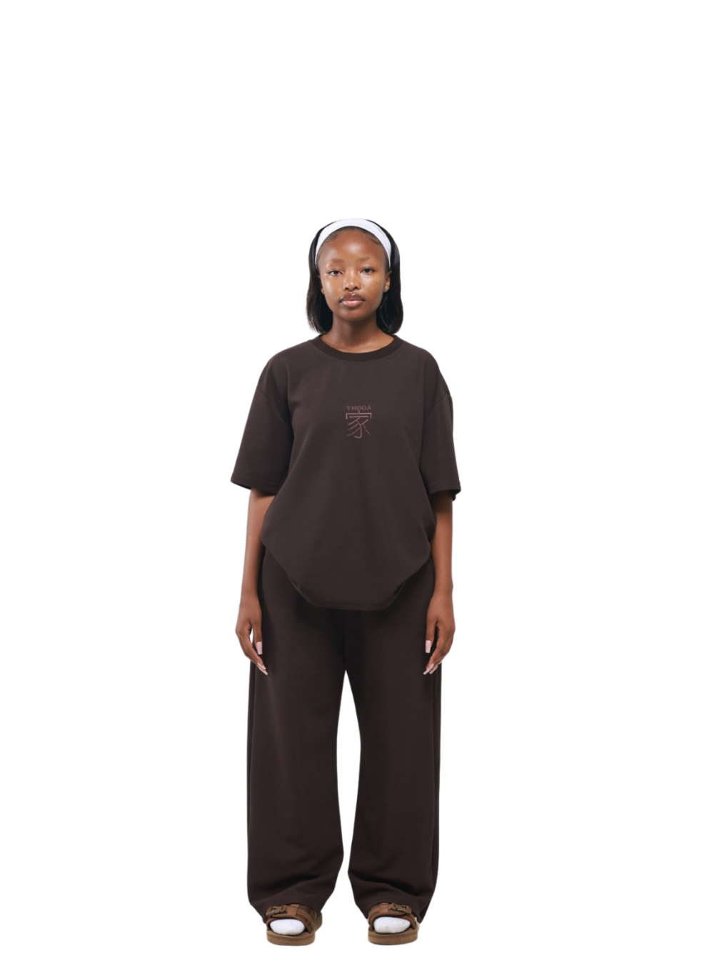 yhooa brown oversized graphic t shirt at unseen grail. local brands south africa. streetwear. men and women. studio image female model full outfit