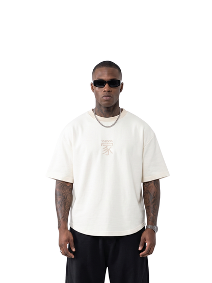 yhooa cream oversized graphic t shirt at unseen grail. local brands south africa. streetwear. men and women. studio image male model front